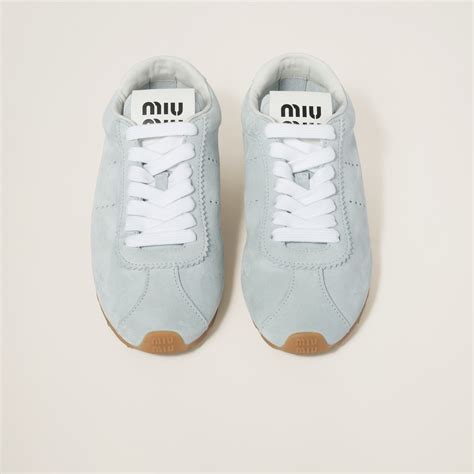 miumiu plume sneakers.